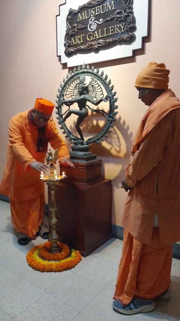The ceremonial lighting of the lamp at the Museum & Art Gallery, marking the auspicious start of the exhibition.